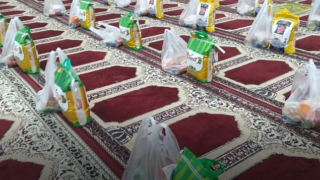 توزیع بسته‌های کمک مومنانه میان خانواده زندانیان مددجو در کرخه